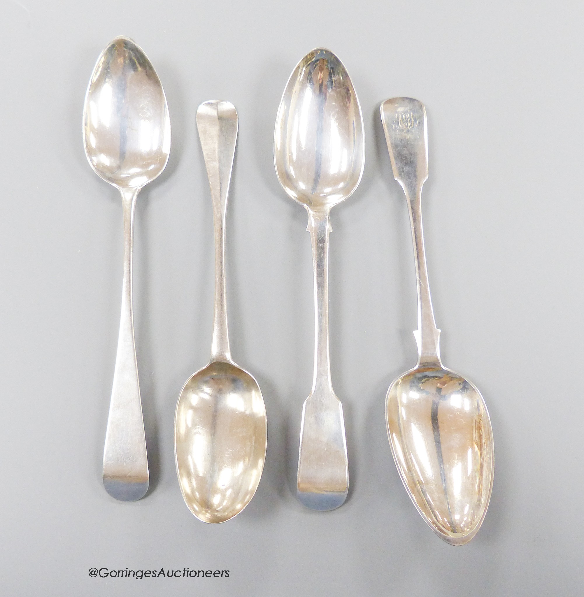 An early 18th century provincial silver rat tail table spoon, William Webb, Winchester, circa 1700, 21.1cm, together with an early 19th century Scottish provincial silver Old English pattern tablespoon, John Ewan?, Aberd